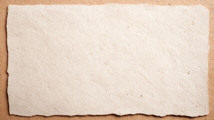 Cream Colored Handmade Paper with Deckle Edges on Textured Brown Craft Paper Natural Stationery and Artisan Background Concept