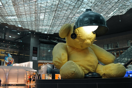 DOHA, QATAR - OCTOBER 25 2025: Famous Lamp Bear Sculpture By Urs Fischer At Hamad International Airport Doha