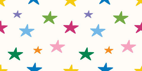 Obraz premium Seamless pattern with colorful stars on a light background for party or kids birthday