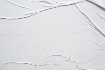 Obraz premium white crumpled and creased glued wrinkled paper poster texture background