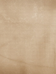 Fototapeta premium Textured beige surface, paper or parchmentlike. Suitable for backgrounds, textures, design elements, and creative projects requiring a neutral base.