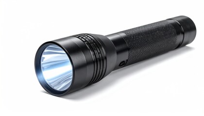 Black metal flashlight illuminating a bright beam on white background.