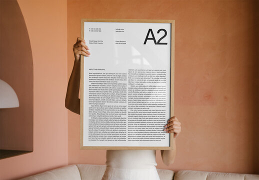 Mockup Of Woman Holding Customized A2 Poster