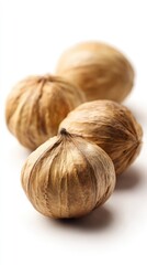Three Dried Nuts On White Background