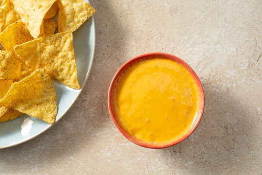 A top down view of a bowl of dairy-free nacho cheese.