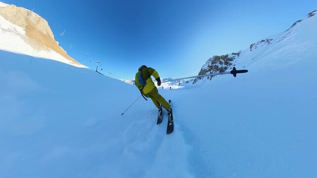 Dynamic First-Person Skiing Down a Sun-Drenched Snowy Mountain Slope on a Bright Winter Day