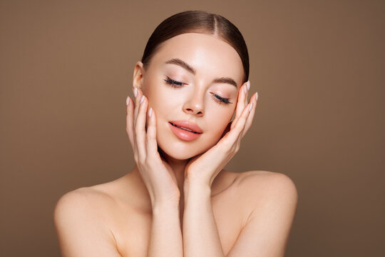 Portrait beautiful young woman with clean fresh skin. Model with healthy skin, close up portrait. Cosmetology, beauty and spa