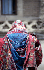 Woman in veil shopping at the market in Yemen's capital, Sana'a
