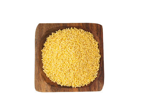 Raw millet grains pile isolated. Little yellow cereal, natural foxtail small seeds