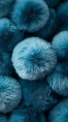 Close-up view of soft, fluffy pom-poms arranged together, showcasing intricate textures and vibrant colors, creating visually appealing abstract composition for creative projects.