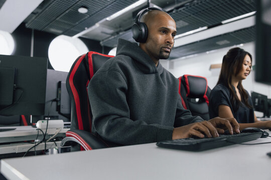 Computer game designer programming in a workspace