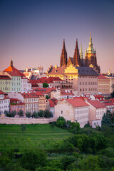 Naklejka premium Prague, Czech Republic. Aerial cityscape image of Prague, capital city of Czech Republic with St. Vitus Cathedral at twilight blue hour.