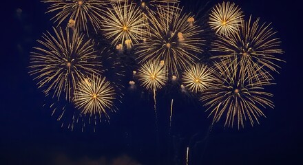 Yellow fireworks exploding in dark blue night sky ramadan kareem islamic eid mubarak background download 2026 2027