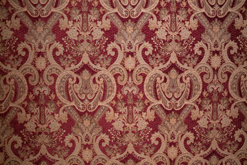 Fototapeta premium A richly detailed damask-style wallpaper photographed inside one of the historic chambers of the Royal Castle in Warsaw.
