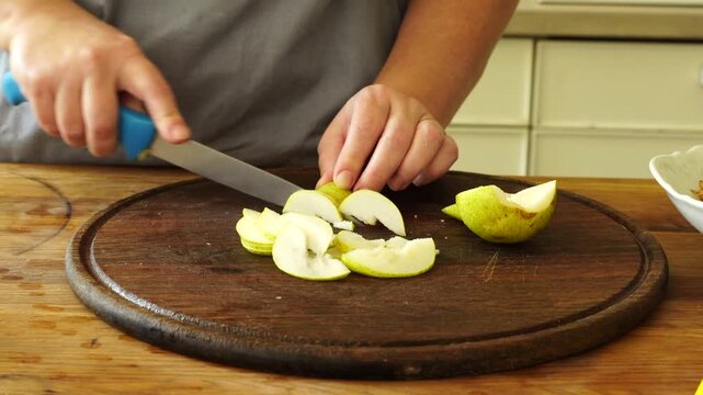 Woman makes an apple pie
