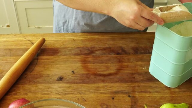 Woman makes an apple pie
