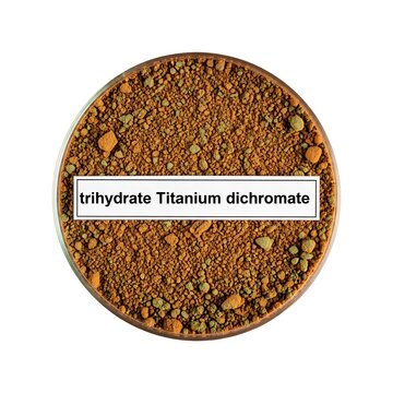 Top view of trihydrate Titanium dichromate powder in a circular container on a plain white surface