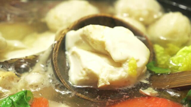 Japanese Hot Pot Cooking in Winter &ndash; Steaming Nabemono with Vegetables and Fish Close-Up