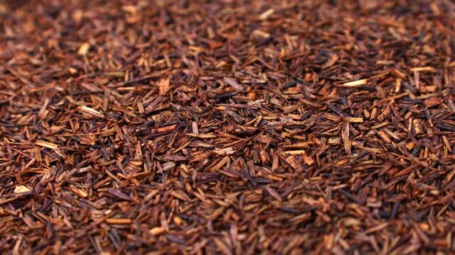 Rooibos tea dried leaves texture circle rotation close up