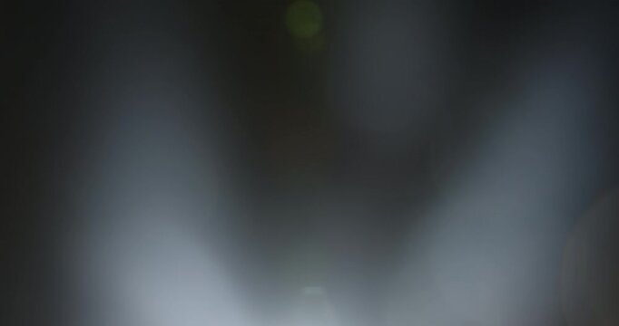 A serene abstract background with a smooth blend of light and dark areas, creating an ethereal effect.