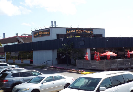Ottawa, ON, Canada-July 11,2025: The exterior of "Liam Maguire's Irish Pub" at  1705 St. Laurent Blvd.
