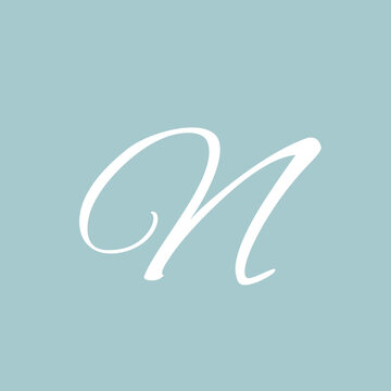 Elegant white cursive capital letter n initial monogram design displayed prominently against a calming soft pastel blue background ideal for branding