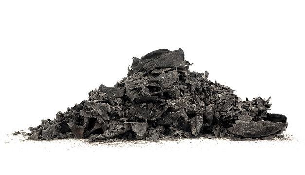 Pile of charred paper scraps isolated on a white background. Ash from burning paper.