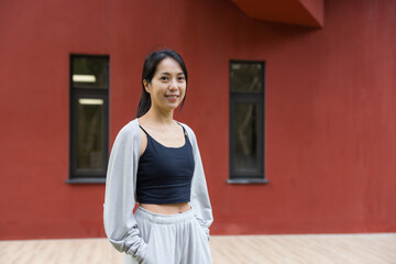 Woman smile to camera at outdoor daylight