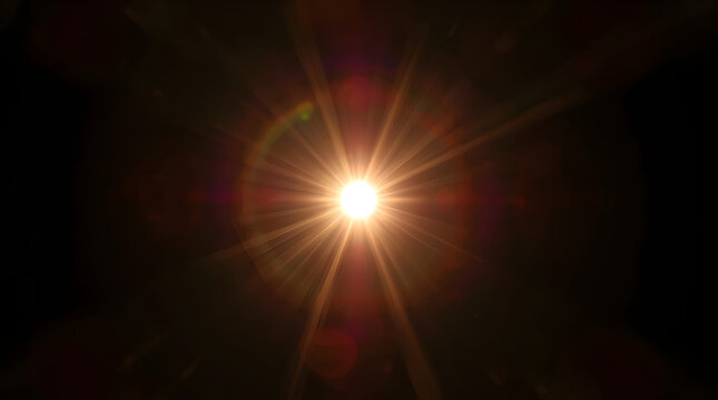 Bright glowing light with haze and lens flare on a dark background for design purposes.