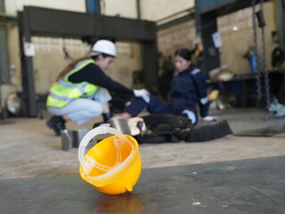 Accident at work of construction worker at site. Safety team helps employee accident.