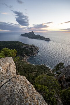 View of mountains and coast with sea, at sunset, walking to La Trapa from Sant Elm, back island of Sa Dragonera, Serra de Tramuntana, Majorca, Spain