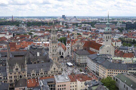 View over Munich, Marienplatz with Old and New Town Hall, Holy Spirit Church and St. Peters Church, Munich, Bavaria, Germany