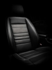 Obraz premium Luxury black leather car seat interior close-up, modern automobile design