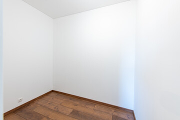 Fototapeta premium Empty Minimalist Room with Wooden Floors and White Walls