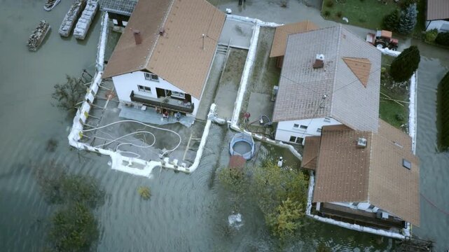 Devastating aerial view captures residential neighborhood submerged in floodwaters. disaster resilience and the urgent reality of climate change