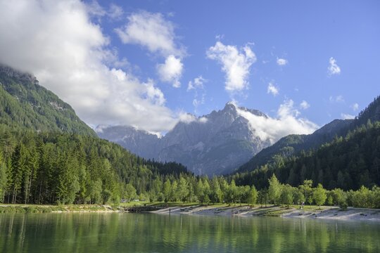 View from the bathing lake Jezero Jasna to Razor (in clouds) and Prisank (Prisojnik) 2.547m, Kranjska Gora, Slovenia