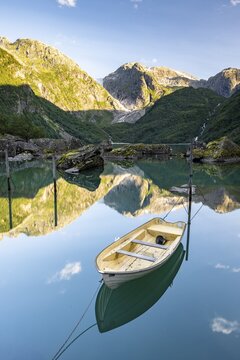 Glacial lake Bondhusvatnet with rowing boat, Bondhusdalen, Bondhusbreen, Folgefonna National Park, Maurangerfjord, Hardangerfjord, Hardanger Region, Norway