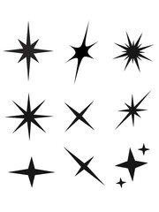 Obraz premium Minimalist black star shapes and magic sparkle decorative elements.