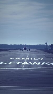 Family getaway scene, commercial airplane accelerating on runway at sunrise, symbolizing family travel, holiday departure and anticipation of vacation, adventure and escape