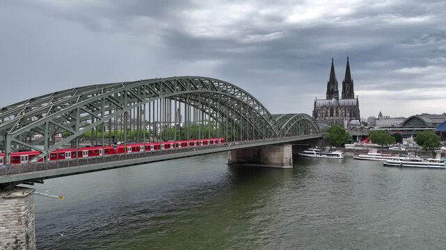 Hohenzollern Bridge, Cathedral in Cologne City, Germany. Drone.