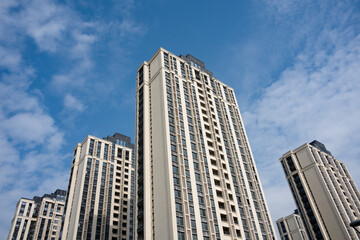 Fototapeta premium High-rise residential buildings under blue sky