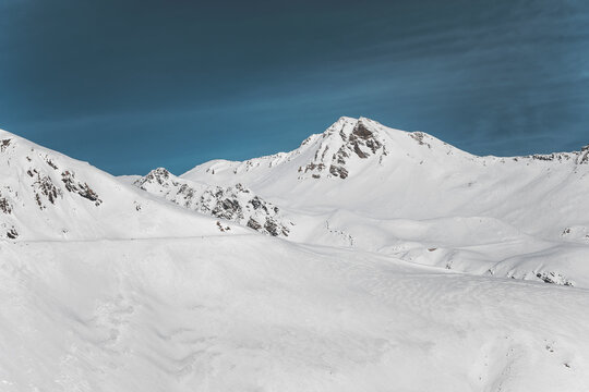 minimal view of snow covered mountain near col de lautaret in french alps