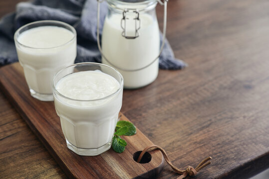Two glasses of Turkish traditional drink ayran, kefir or buttermilk