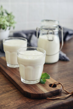 Two glasses of Turkish traditional drink ayran, kefir or buttermilk