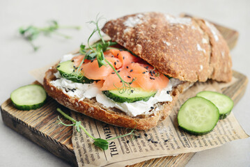 Rye bread sandwich with salted salmon,