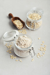 Oat flour in glass jar