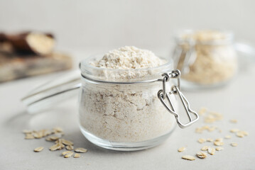 Oat flour in glass jar