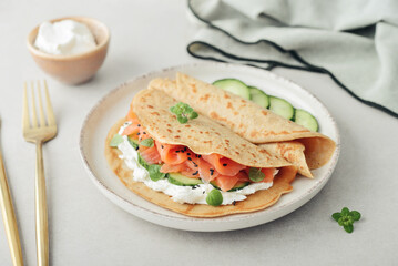 Oatmeal pancakes with slightly salted salmon