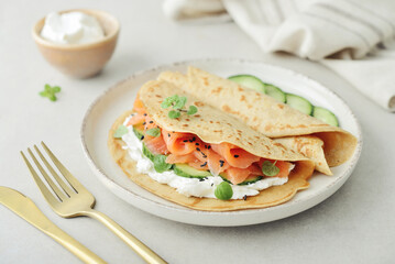 Oatmeal pancakes with slightly salted salmon