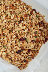 Gluten-free oat granola with nuts and berries.